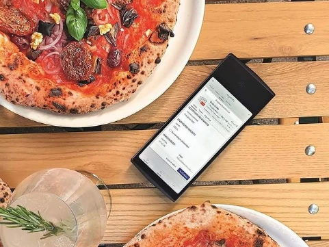 ServisaPOS Donner Abrechungsgerät am Tisch
